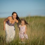 mother and pre school daughter in summer dresses, summer photoshoot at the meadows