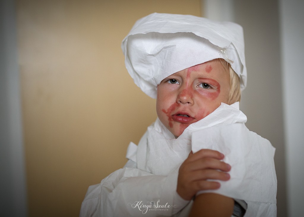 toilet paper mummies game boy portrait, family in home documentary photoshoot