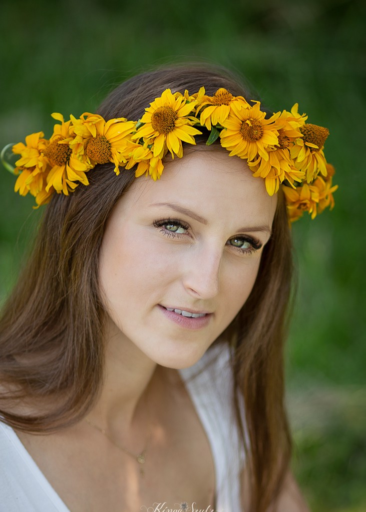 female summer portret with yellow head wreath