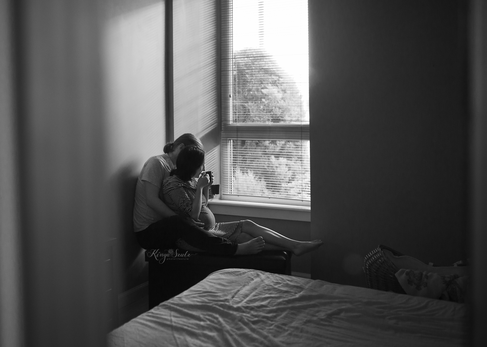 pregnancy couple in home maternity photoshoot, black and white photo