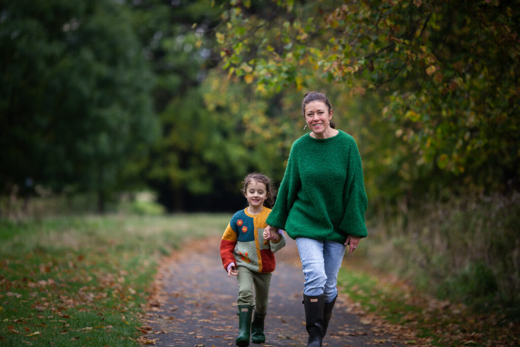 Family photoshoot in Glasgow featuring a mother and daughter spending time together outdoors. Natural family photography documenting real moments and meaningful connections.