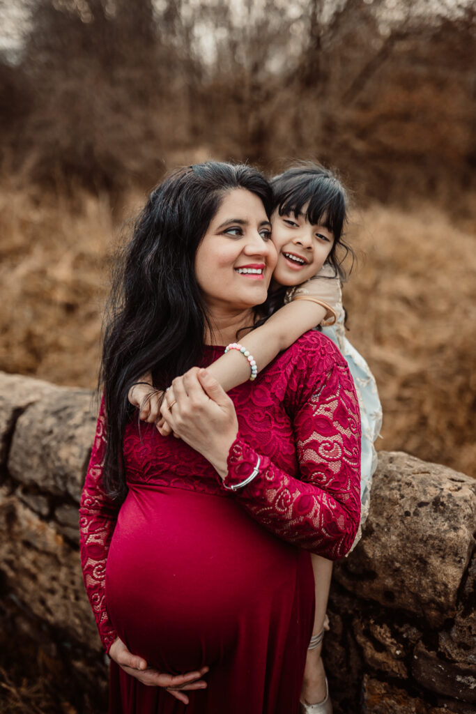Mum and daughter enjoying time together during a relaxed outdoor family photoshoot in Glasgow. Natural family photography in Scotland focused on real smiles, connection and authentic moments.